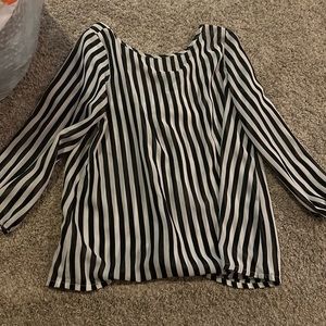 Black and white strip dress shirt. With open back and a bow